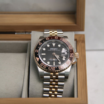 Montre Seiko mod gmt Root beer dans boite à montres.